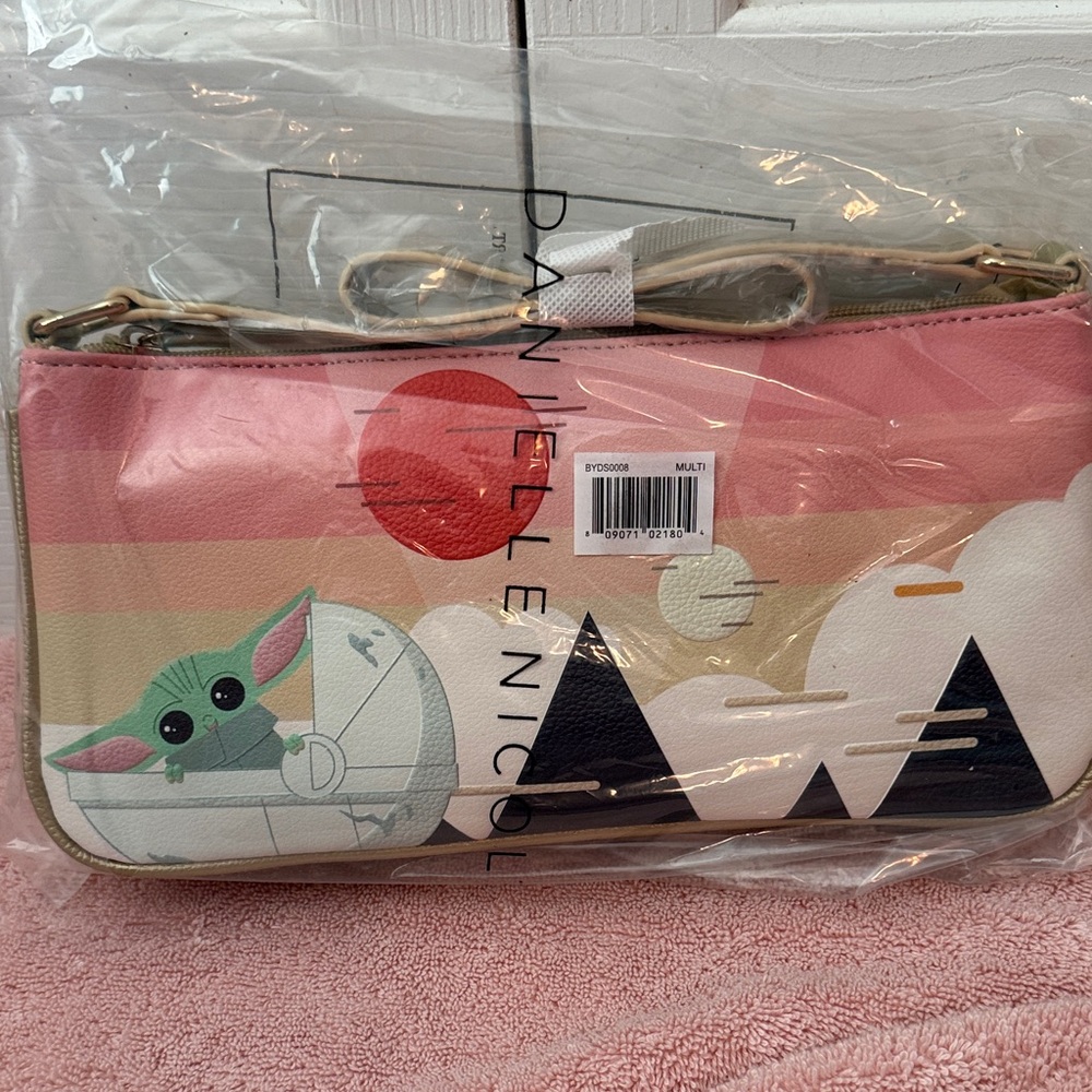Danielle Nicole Pink and Cream Grogu Clutch